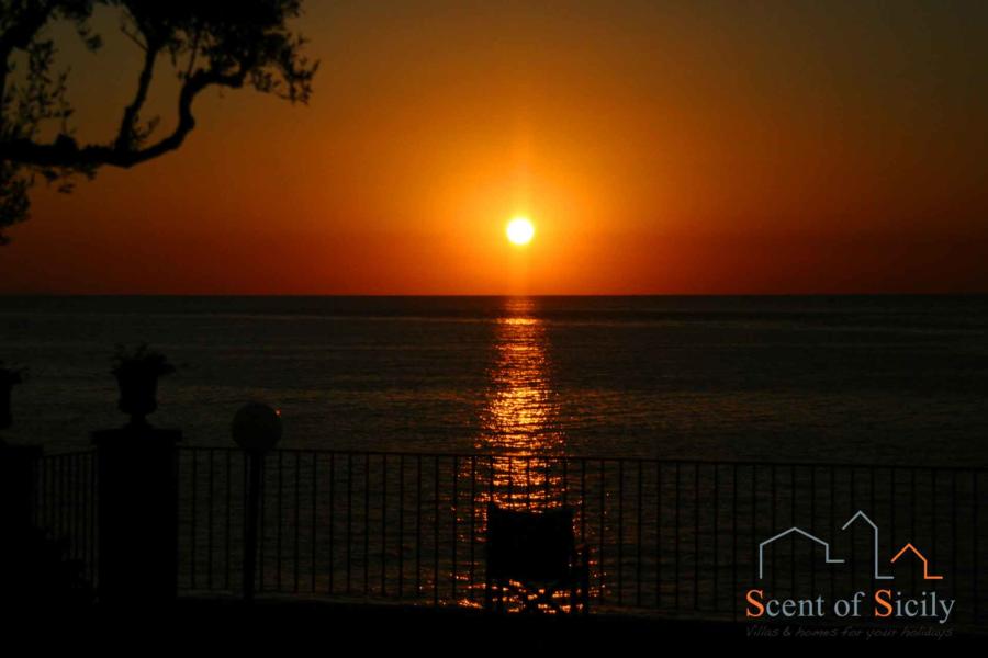 Sunset from Sea Terrace garden Torre Archirafi, Estern Sicily 
