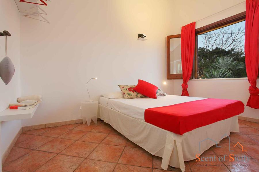 Red double bedroom in Villa Lory, Marsala Western Sicily - main house