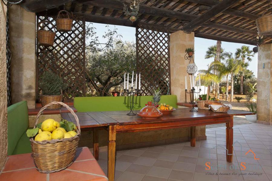 Eating in the patio in Villa Gio, Marsala, Western Sicily