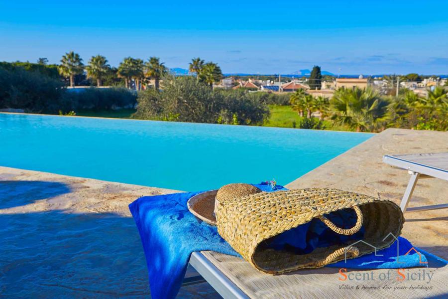 The sunbed in the pool area of  Villa Panorana, Marsala Western Sicily