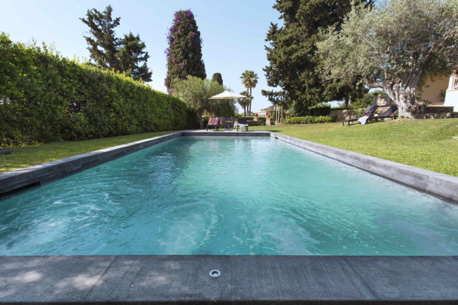 The lava stone pool in Villa Shanti Syracuse Scent of Sicily