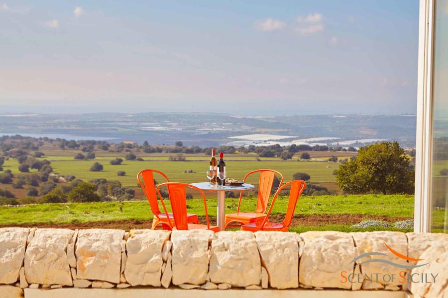 To admire the surrounding area in Vila Bianca Levante Donnafugata Scent of Sicily