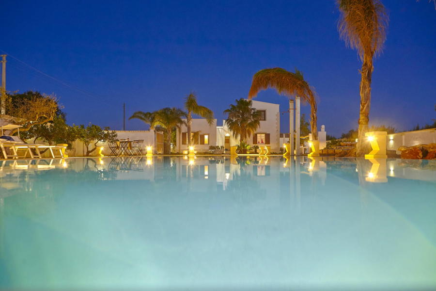 Enjoy the warm evenings from the pool from Villa del Tufo Marsala Scent of Sicily