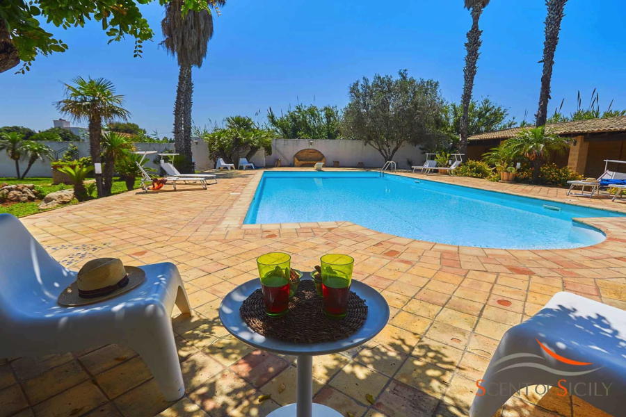 Relax area in the pool of Villa Lory, Marsala Western Sicily