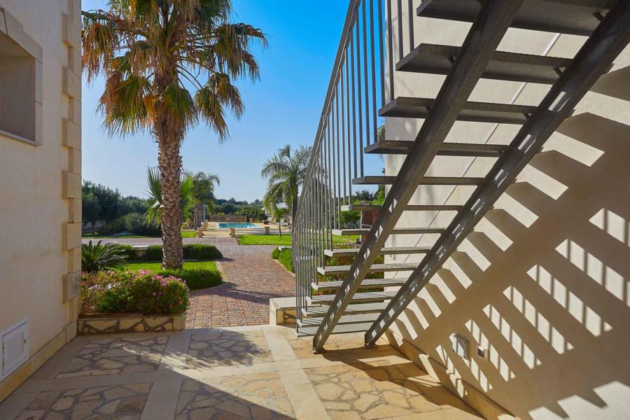 Staircase will take you to one double bedroom in Villa del Tufo Marsala Western Sicily Scent of Sicily