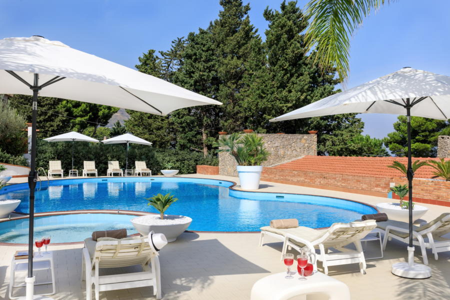 Large swimming pool with jacuzzy area in Villa Amphora Carini Scent of Sicily