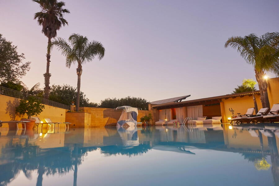 Relax in the pool at sunset