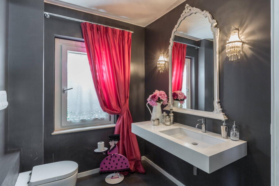 A nice detail of a pink bathroom.