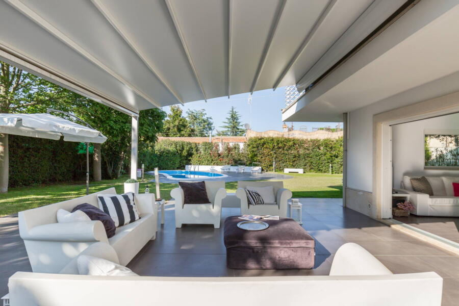 Relax on a sofa in the patio.
