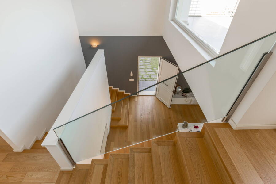 The refined staircase leading to the sleeping area.