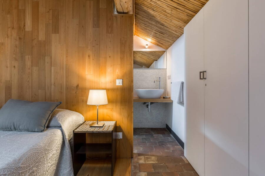 The harmonious bedroom en-suite in the loft