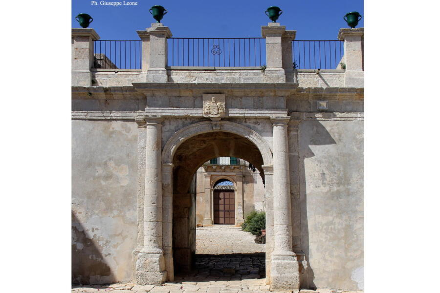 The arch that welcomes you to the courtyard with the main door.