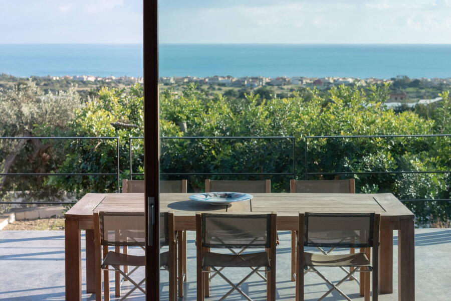 Eat in the harmonious veranda and enjoy its view