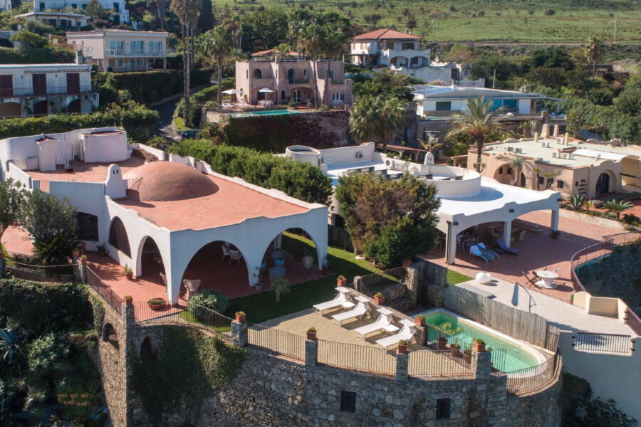 The villa and its patio photographed from the air