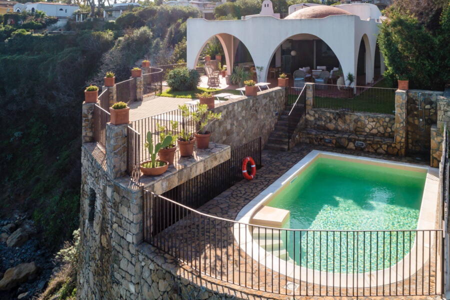 A gate leads to the swimming pool area