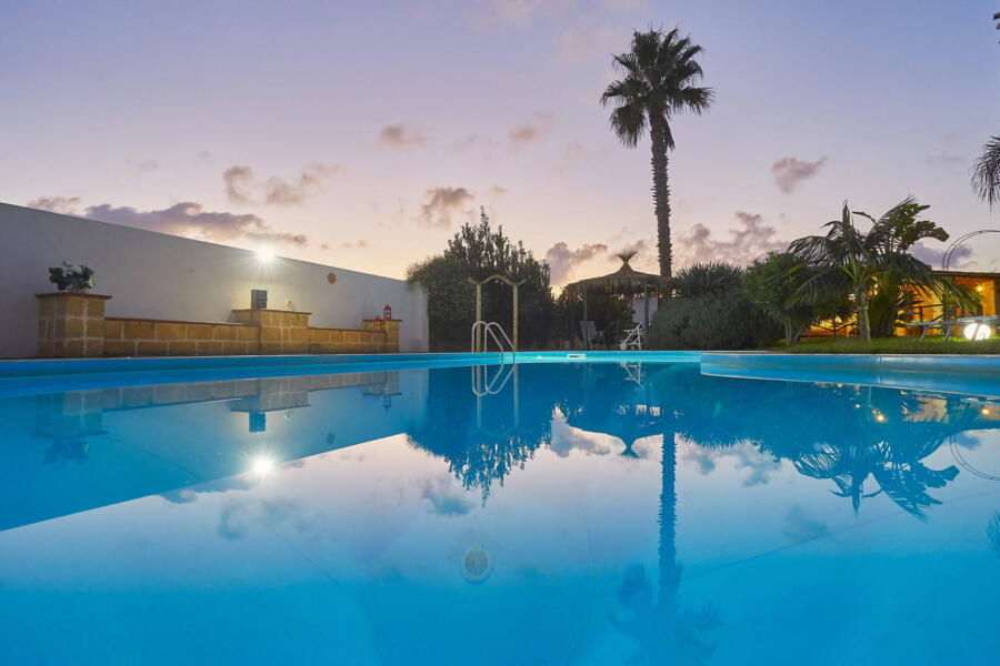 Sunset in the pool of Villa Gio, Marsala, Western Sicily