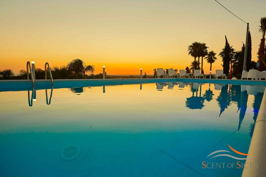 Enjoy the magical colours of the sunset from the swimming pool