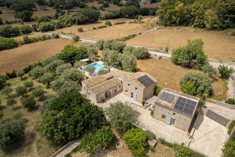 Aerial view of this Sicilian pool villa in Sicilian Baroque, nestled in nature