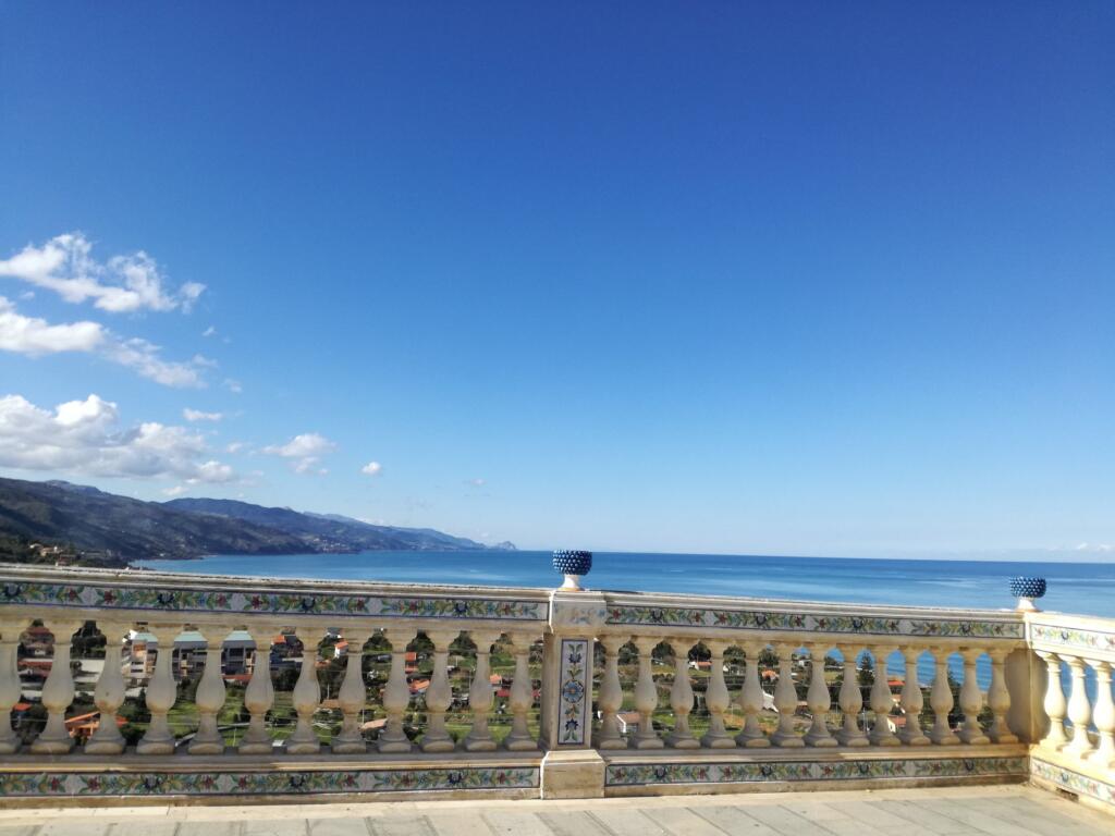 A stunning balcony in Santo Stefano di Camastra overlooking the blue sea.