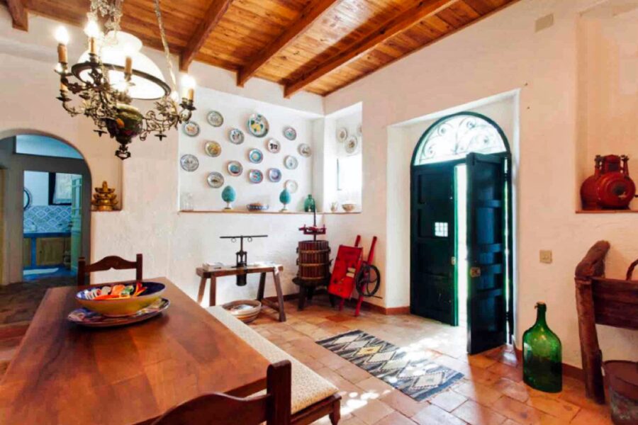 Exquisite Sicily villa with pool surrounded by lush greenery and stunning landscapes.