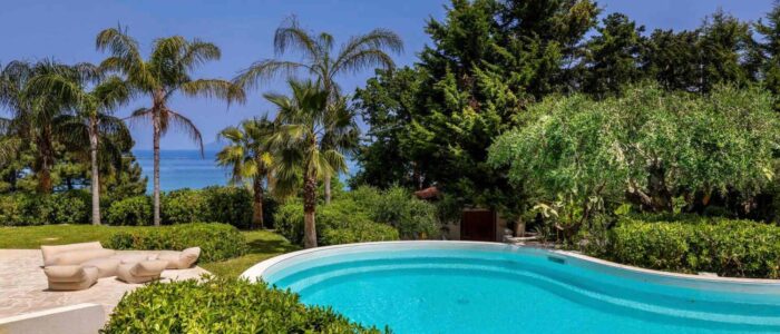 VillaOrlaya-Capo-di-Orlando-Cover-ScentOfSicily Villa Orlaya swimming pool surrounded by palm trees and Mediterranean gardens with sea views, Sicily villas with pool by Scent of Sicily