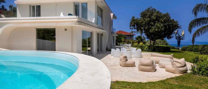Villa Orlaya Contemporary Pool Villa | Sicily Luxury Villas Modern Villa Orlaya with private swimming pool, outdoor lounge area, and sea views in Sicily, Sicily villas with pool by Scent of Sicily